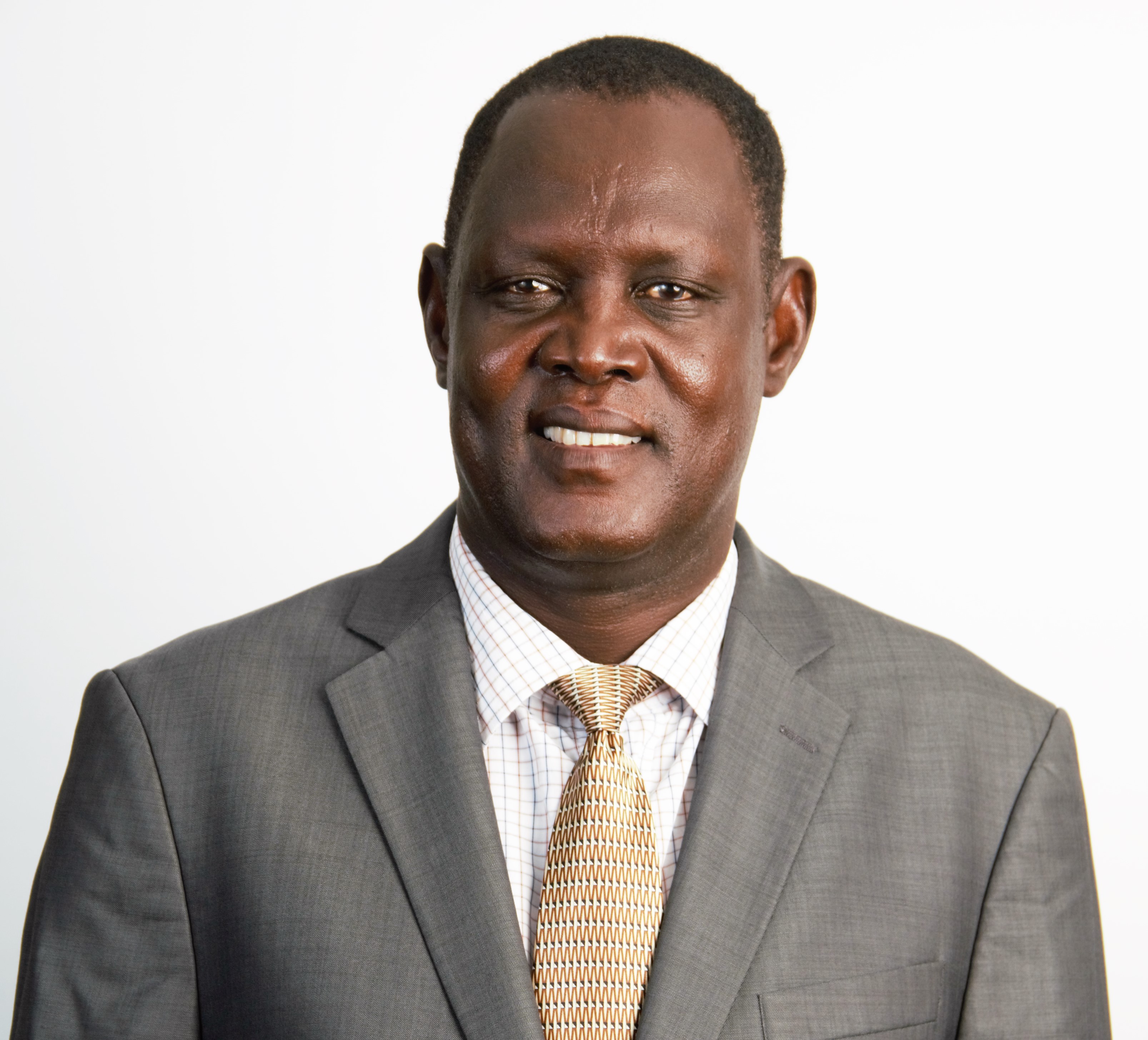 Hon. Nicholas Nixon Ngikar Director 1